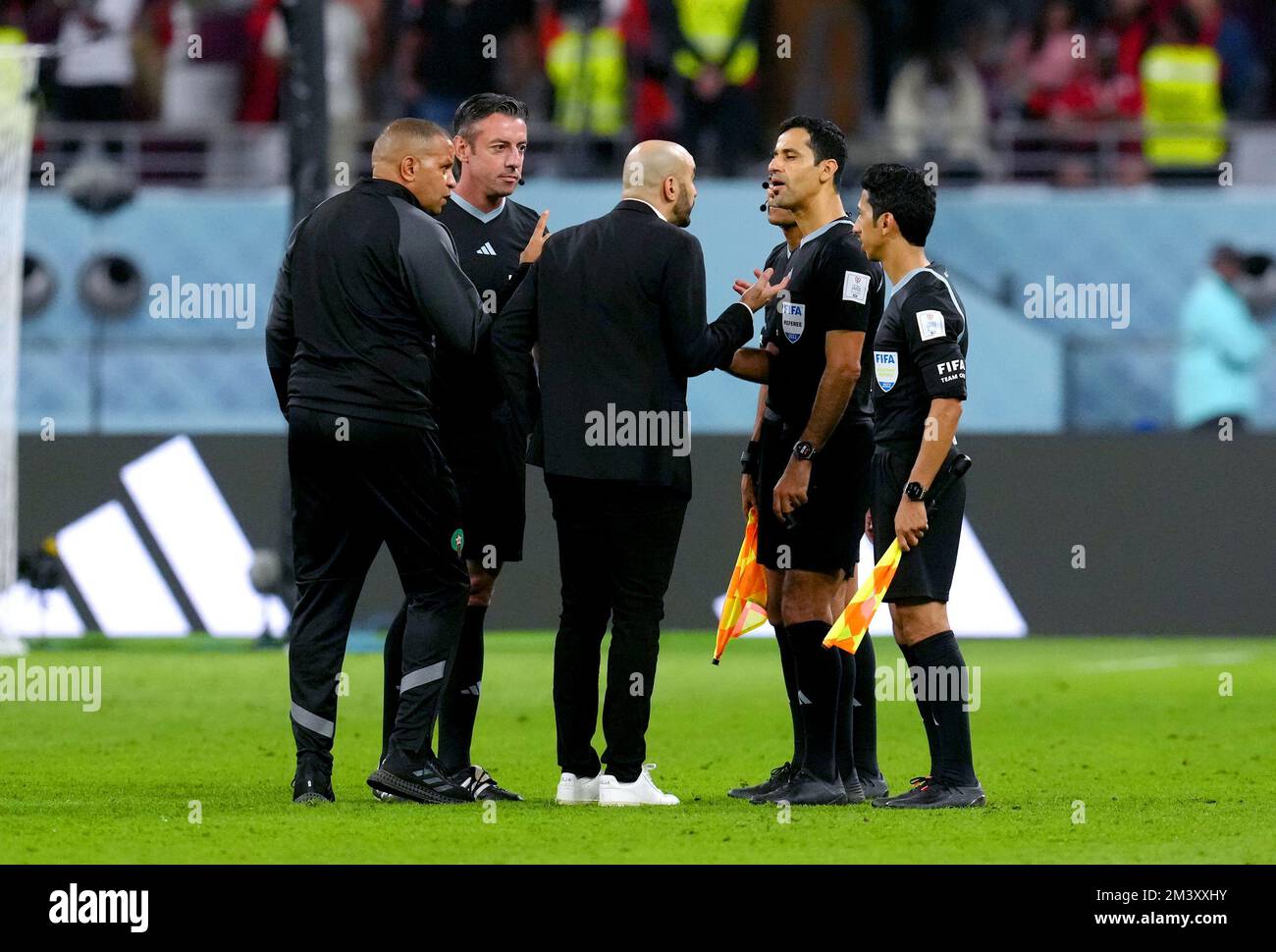 Morocco manager Walid Regragui exchanges words with referee Abdulrahman Al-Jassim at the end of the FIFA World Cup third place play-off match at the Khalifa International Stadium, Doha. Picture date: Saturday December 17, 2022. Stock Photo