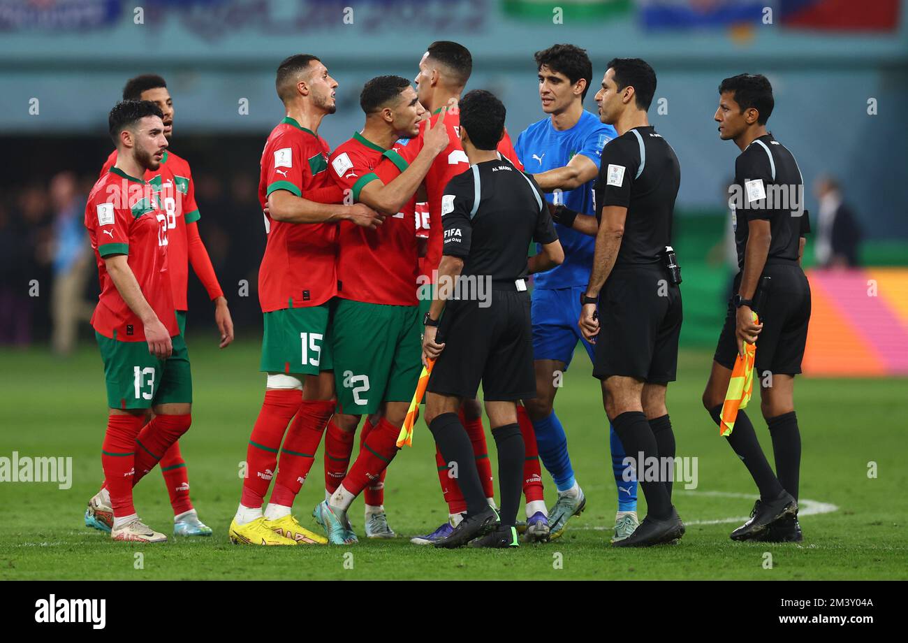 Doha, Qatar. 17th Dec, 2022. Achraf Hakimi of Morocco is held back as he confronts referee Abdulrahman Al Jassim during the FIFA World Cup 2022 match at Khalifa International Stadium, Doha. Picture credit should read: David Klein/Sportimage Credit: Sportimage/Alamy Live News Stock Photo