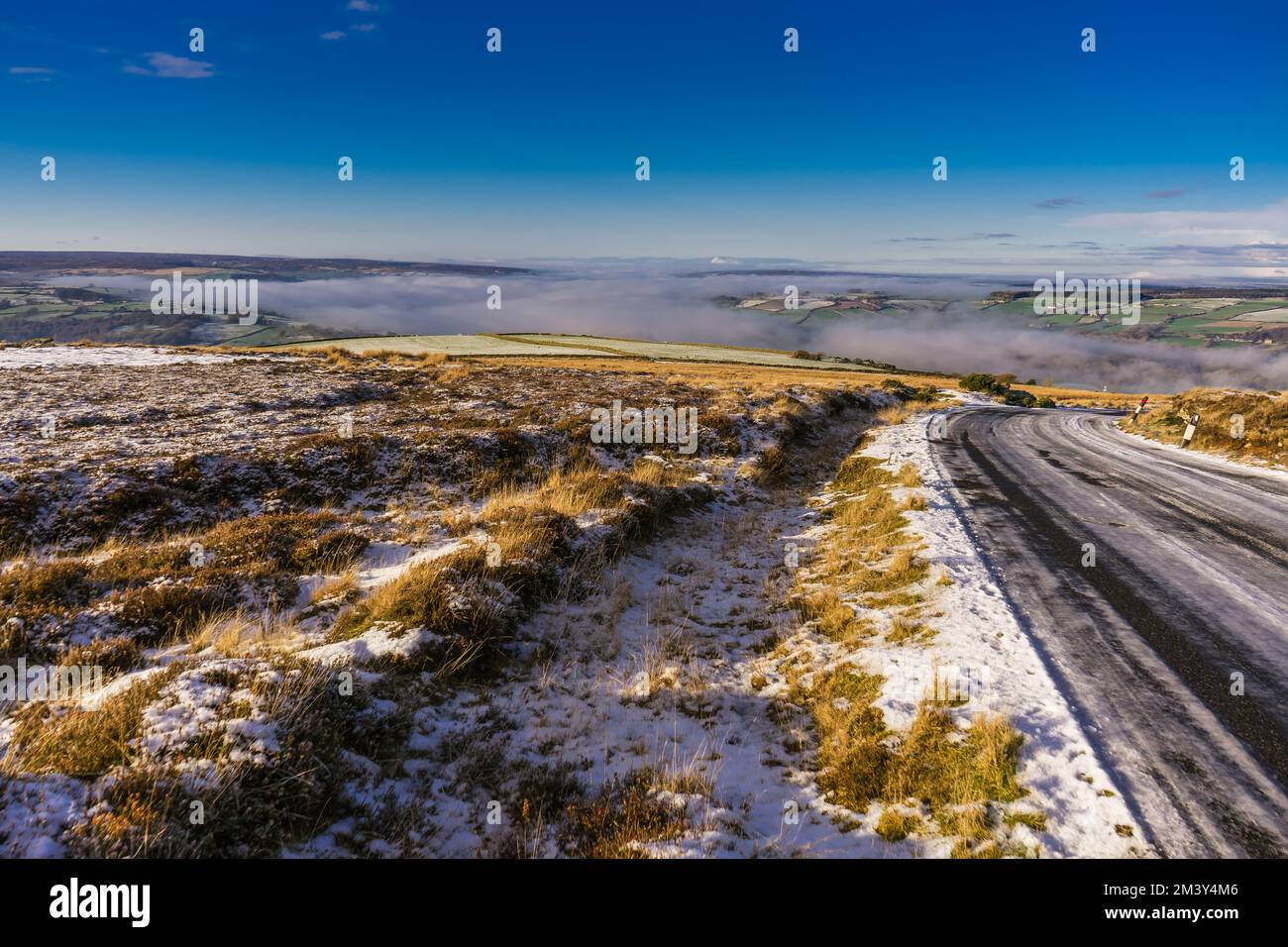 Winter scene on the North Yorkshire Moors above Grosmont - Snow, ice and early morning mist. Stock Photo