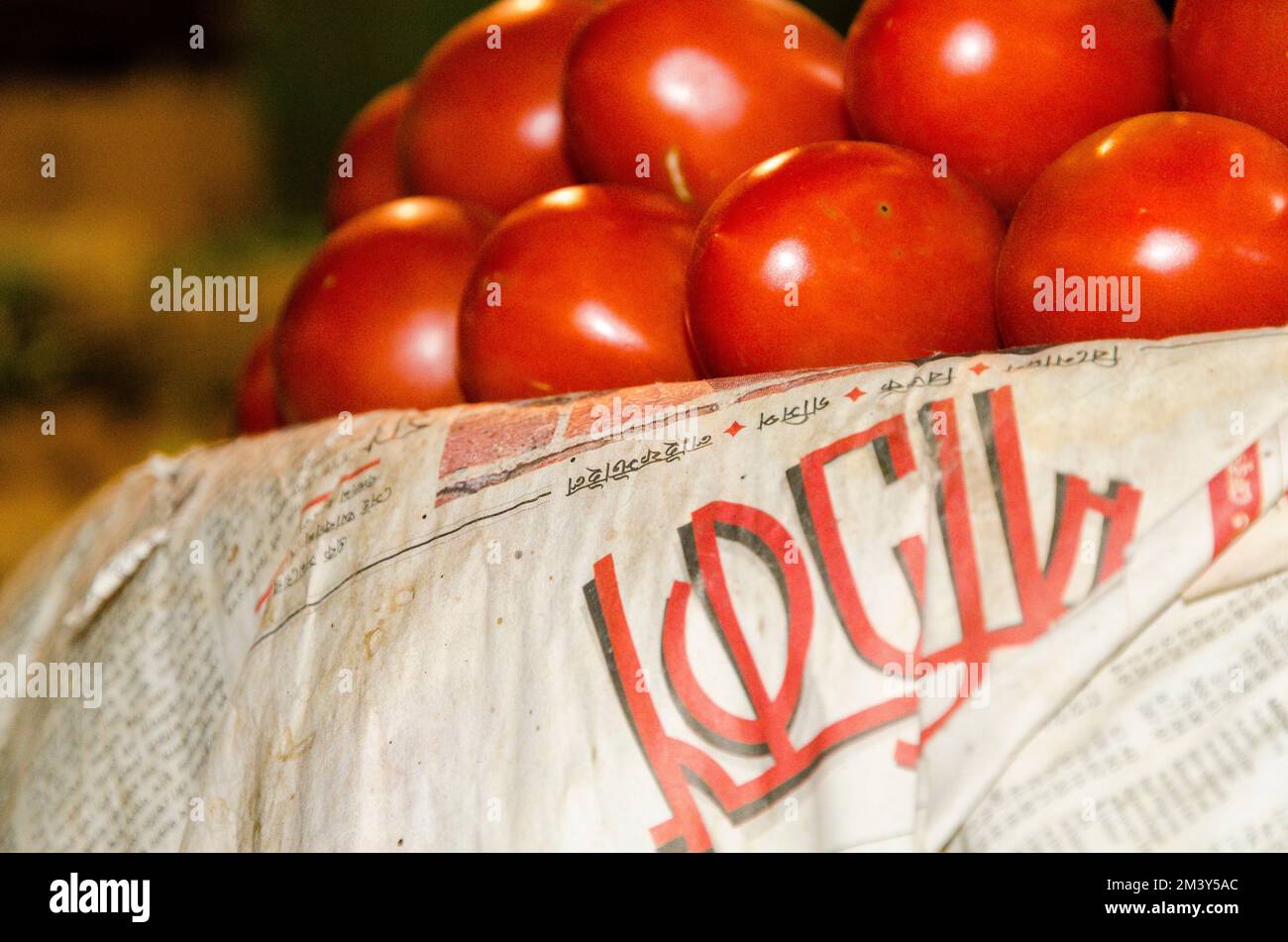 Tomatoes for sale at a vegetable market in the streets Stock Photo - Alamy