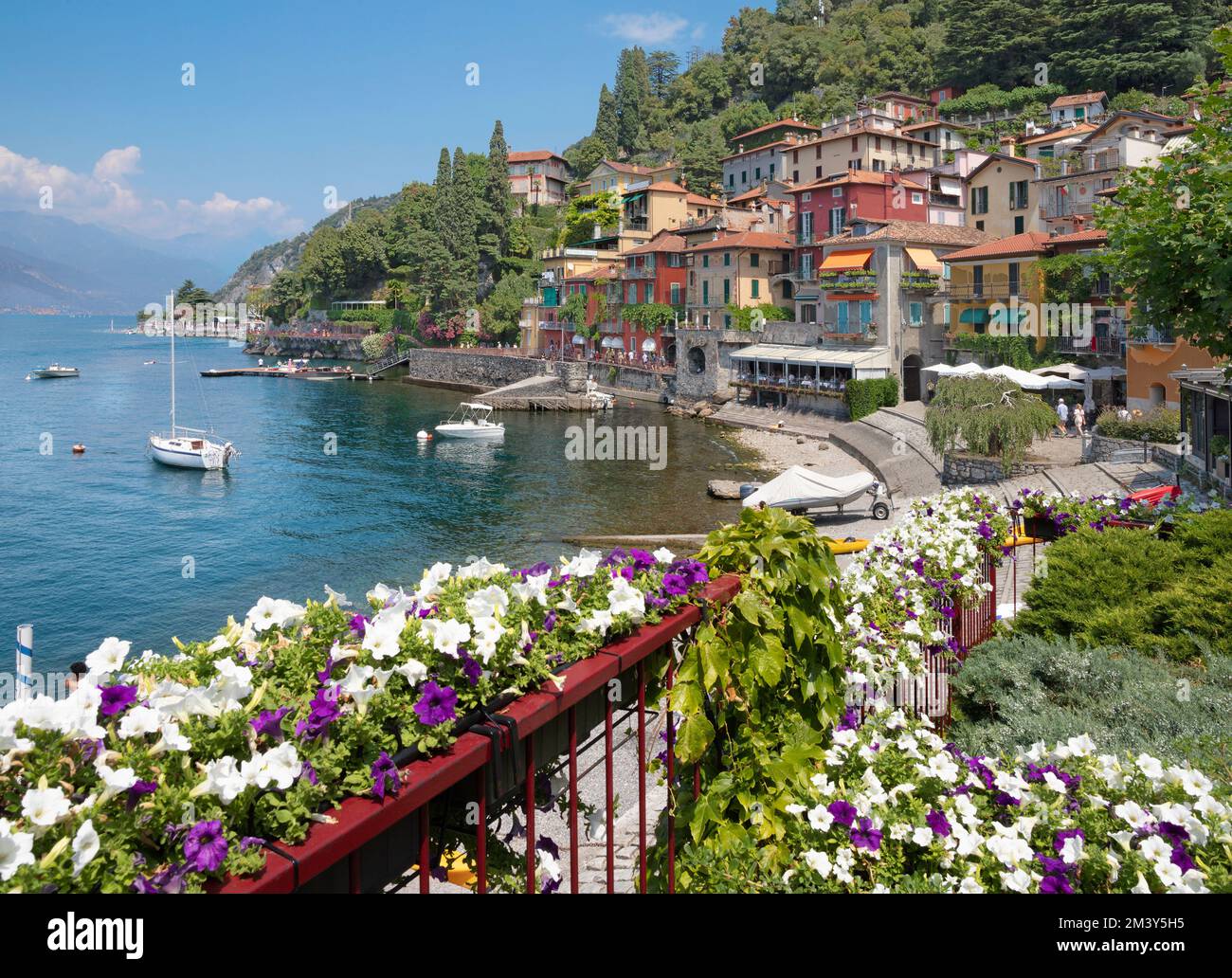 VARENNA, ITALY - JULY 20, 2022: The beach, town and he como lake. Stock Photo