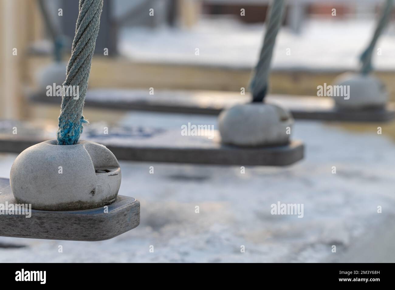 fixing a rope ladder on a sports ground. rope bridge attachment