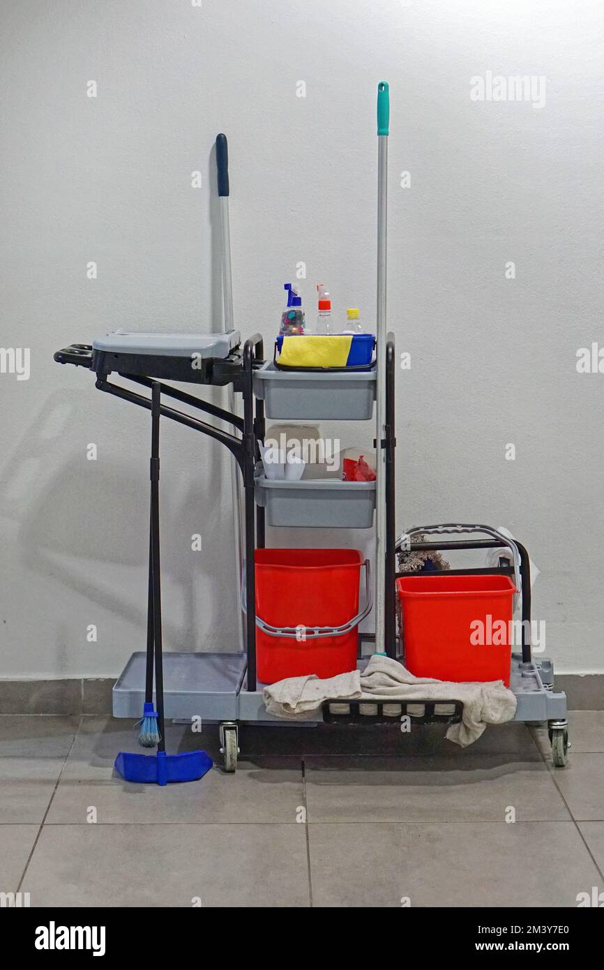 https://c8.alamy.com/comp/2M3Y7E0/professional-cleaning-cart-with-all-janitor-equipment-buckets-and-brums-2M3Y7E0.jpg