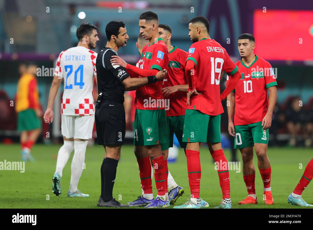 Doha, Qatar. 17th Dec, 2022. Morocco players react to referee Al Jassim Abdulrahman of Qatar during the FIFA World Cup Qatar 2022 3rd place play-off match between Croatia and Morocco at Khalifa International Stadium, Doha, Qatar on 17 December 2022. Photo by Peter Dovgan. Editorial use only, license required for commercial use. No use in betting, games or a single club/league/player publications. Credit: UK Sports Pics Ltd/Alamy Live News Stock Photo