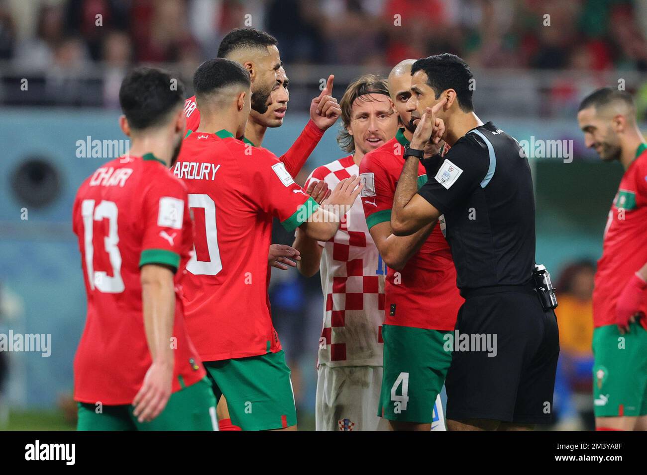 Doha, Qatar. 17th Dec, 2022. Moroccan players argue with referee Al Jassim Abdulrahman of Qatar during the FIFA World Cup Qatar 2022 3rd place play-off match between Croatia and Morocco at Khalifa International Stadium, Doha, Qatar on 17 December 2022. Photo by Peter Dovgan. Editorial use only, license required for commercial use. No use in betting, games or a single club/league/player publications. Credit: UK Sports Pics Ltd/Alamy Live News Stock Photo