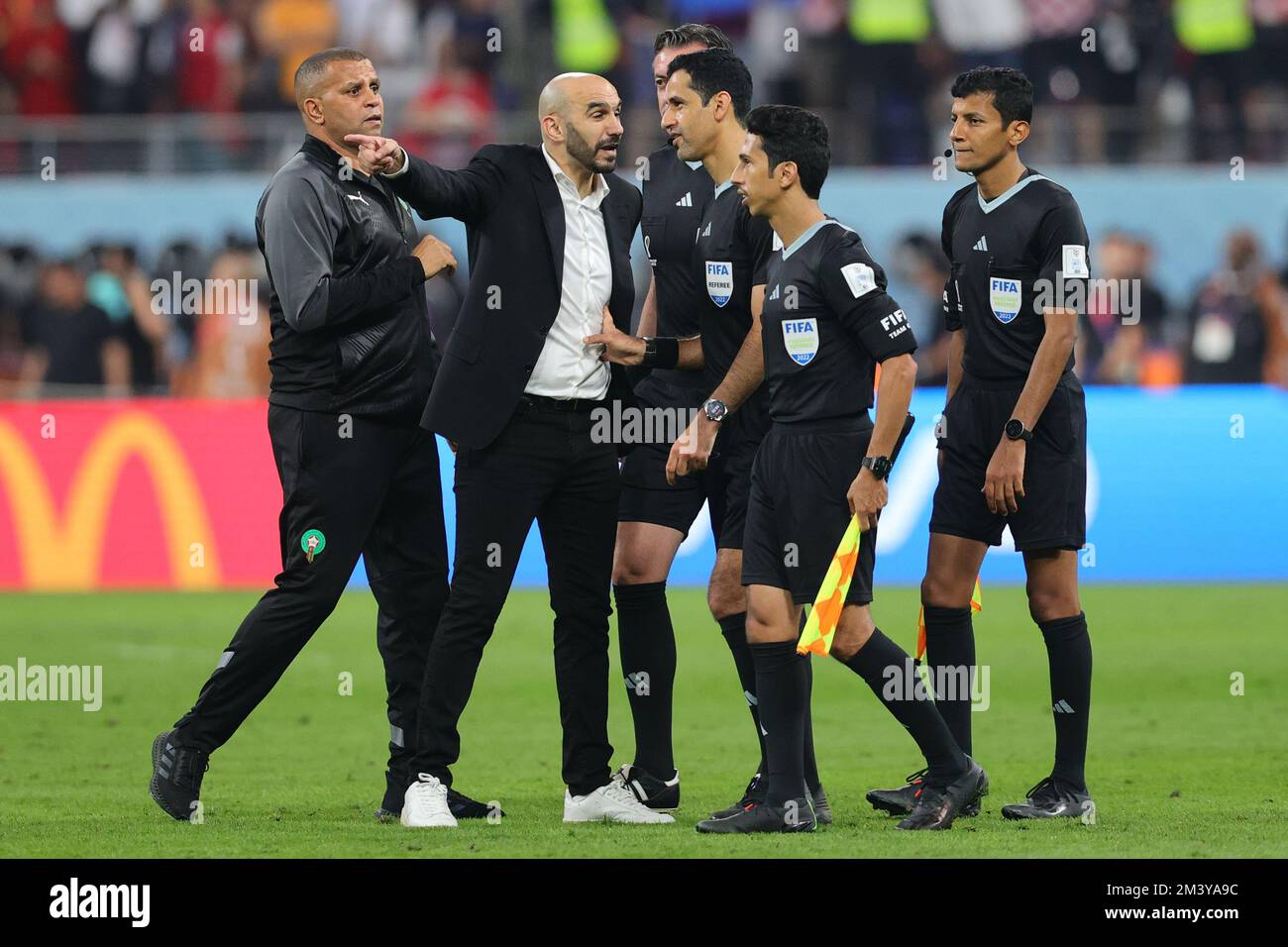 Doha, Qatar. 17th Dec, 2022. Walid Regragui Head Coach of Morocco argues with referee Al Jassim Abdulrahman of Qatar at the end of the match during the FIFA World Cup Qatar 2022 3rd place play-off match between Croatia and Morocco at Khalifa International Stadium, Doha, Qatar on 17 December 2022. Photo by Peter Dovgan. Editorial use only, license required for commercial use. No use in betting, games or a single club/league/player publications. Credit: UK Sports Pics Ltd/Alamy Live News Stock Photo