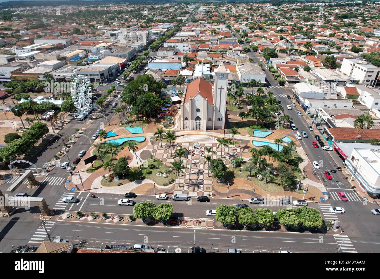 An aerial view of Santo Antonio da Platina cityscape with church and Ferris Wheel in Brazil Stock Photo