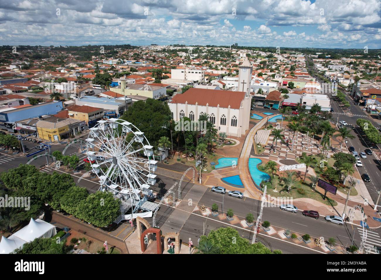 An aerial view of Santo Antonio da Platina cityscape with church and Ferris Wheel in Brazil Stock Photo
