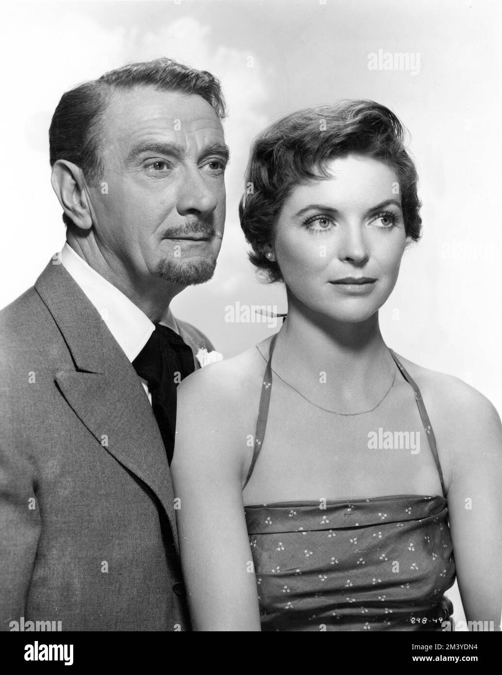 CLIFTON WEBB and DOROTHY McGUIRE Publicity Portrait in THREE COINS IN THE FOUNTAIN 1954 director JEAN NEGULESCO novel John H. Secondari screenplay John Patrick costumes designed by Dorothy Jeakins music Victor Young producer Sol C. Siegel Twentieth Century Fox Stock Photo