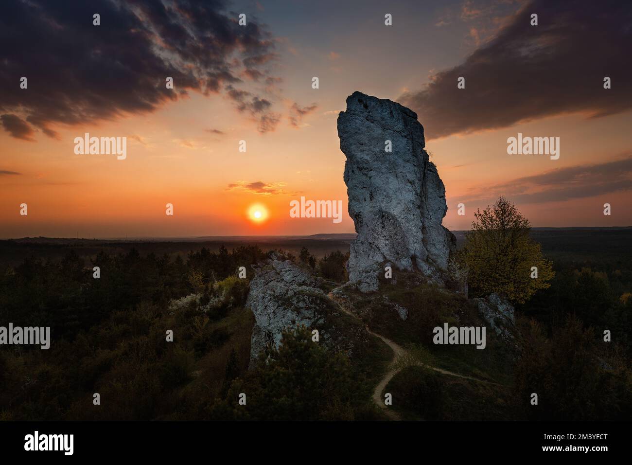 Sunset on Wysoka rock formation in Skaly Rzedkowickie, Jura Krakowsko-CzestochowskaPoland Stock Photo