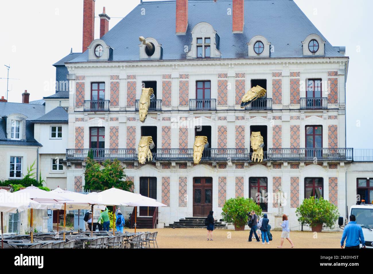 tourists visit the famous dragon building in Blois France. Stock Photo