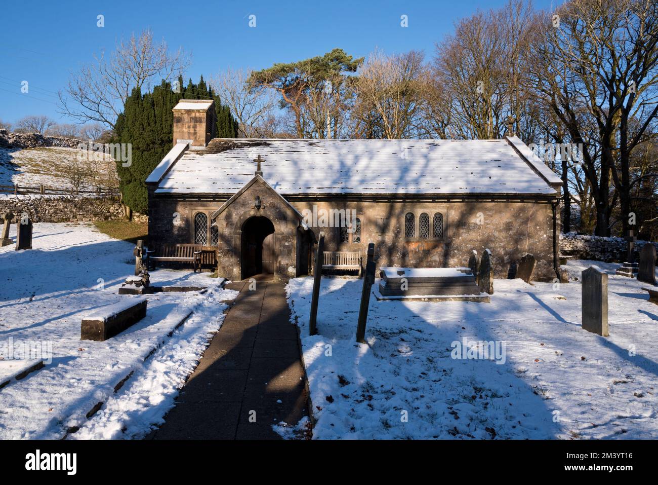 The listed St Leonard's Church, in the hamlet of Chapel-le-Dale, Ingleton, Yorkshire Dales National Park. Stock Photo