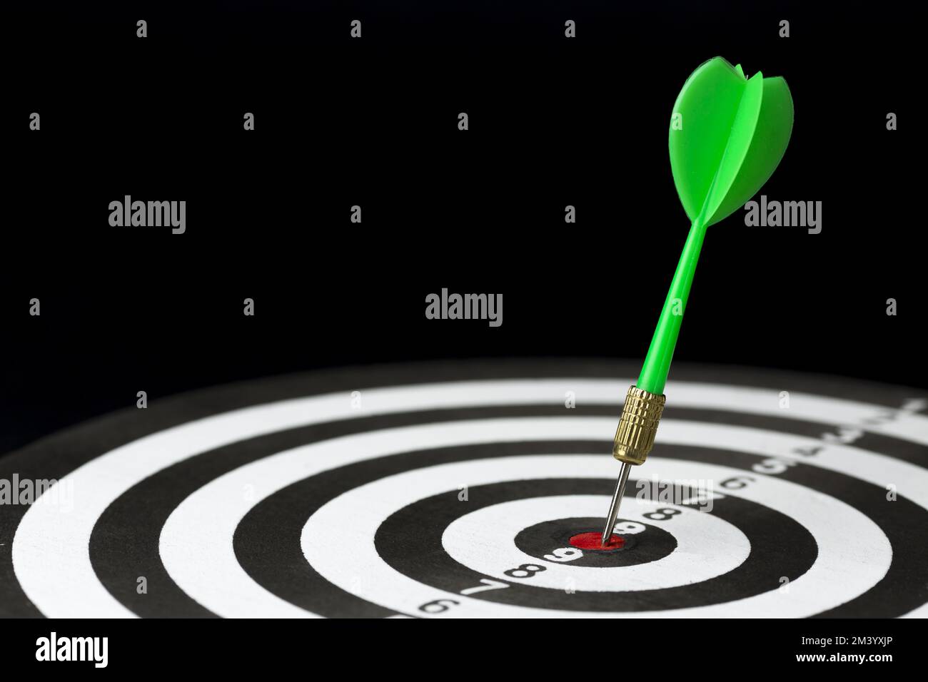 High angle dart stuck target bullseye Stock Photo - Alamy