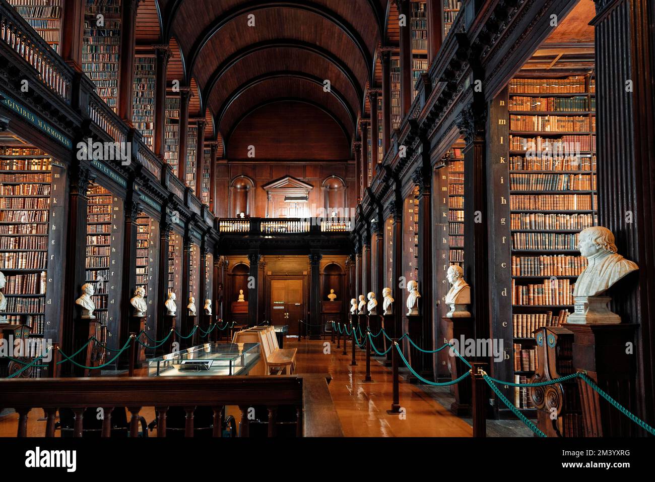 Old Library From The 18th Century, Bookshelves And Busts In The Long 