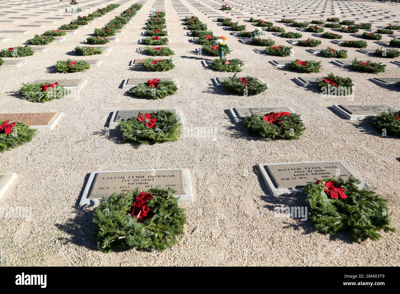 Rows of headstones with wreaths that were laid down for the annual ...