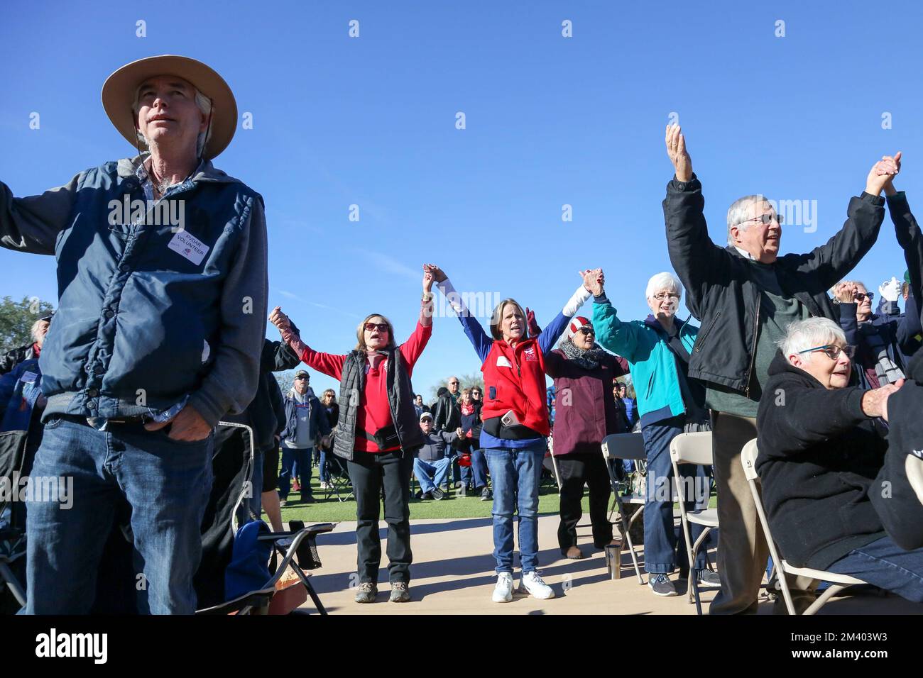 The Crowd All Joins Hands And Sings Along To The Song I m Proud To Be 