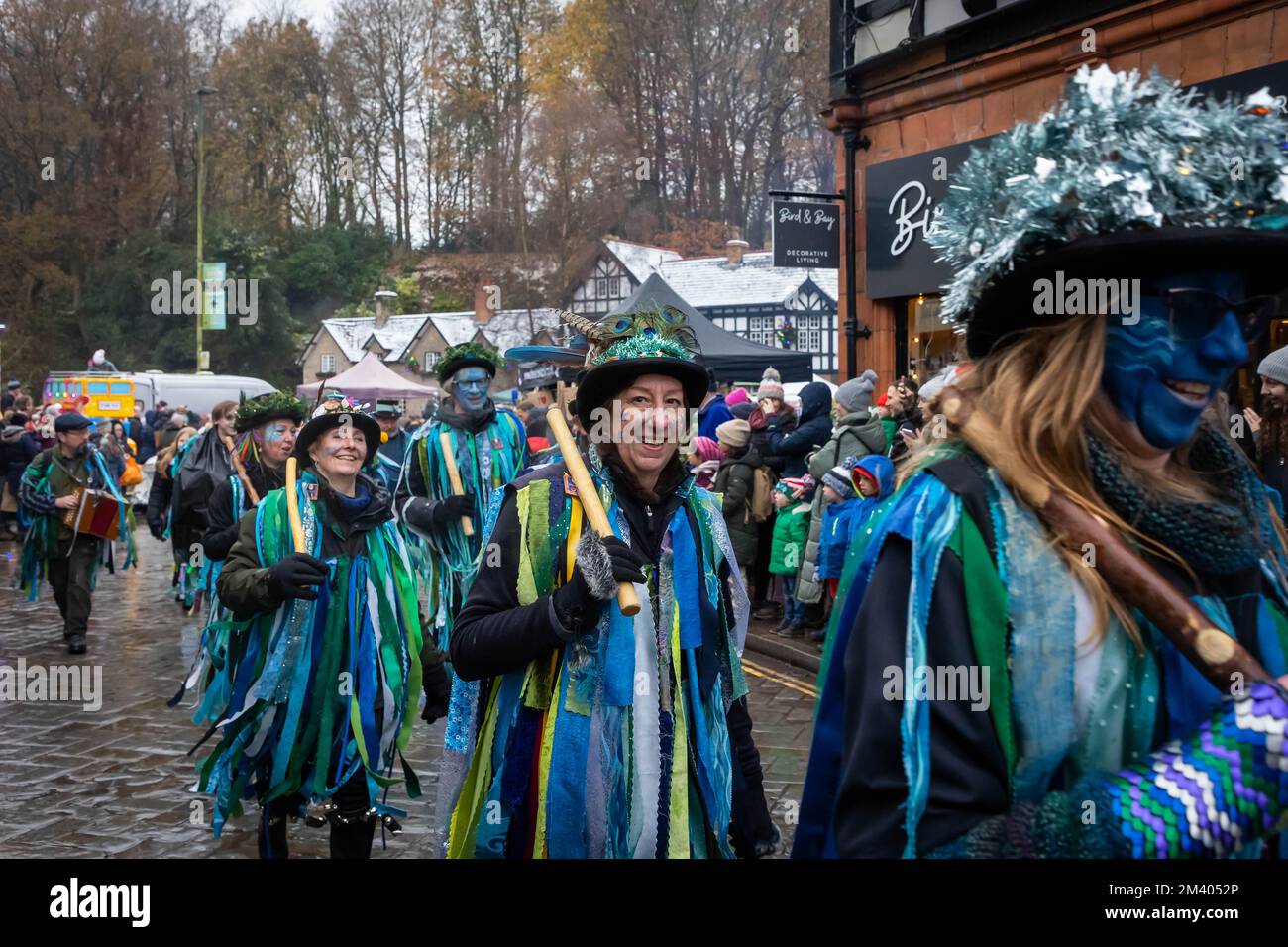 The Bollin Morris Dancers perform in the street during the Grand Parade