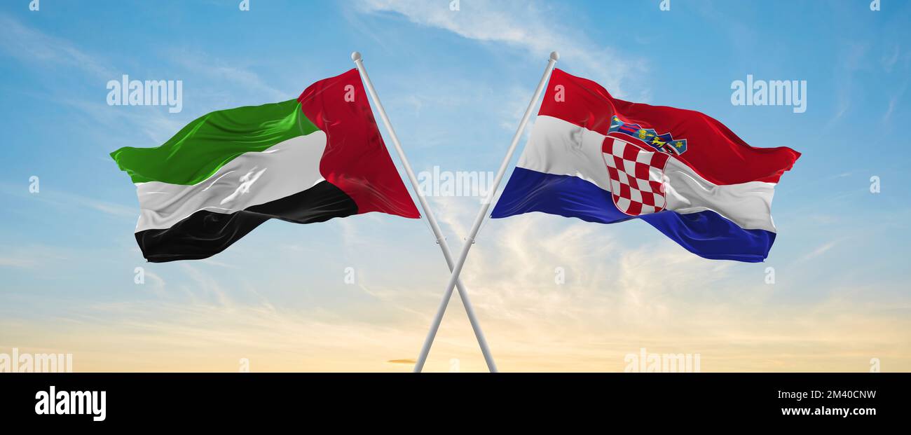two crossed flags Croatia and United Arab Emirates waving in wind at ...