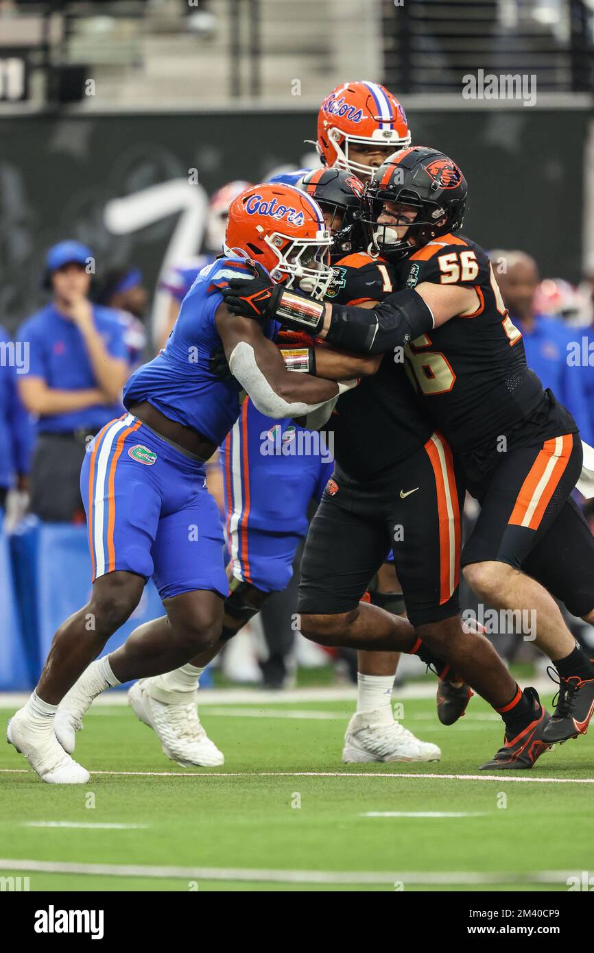 December 17, 2022: Florida Gators running back Montrell Johnson Jr. (2) is tackled by Oregon State Beavers linebacker Riley Sharp (56) during the second half of the SRS Distribution Las Vegas Bowl featuring the Florida Gators and the Oregon State Beavers at Allegiant Stadium in Las Vegas, NV. Christopher Trim/CSM. Stock Photo