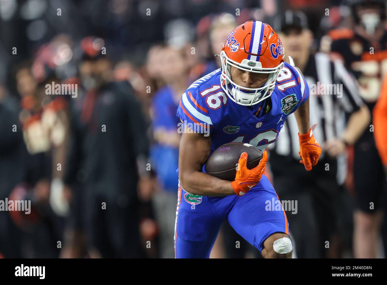 Las Vegas, NV, USA. 17th Dec, 2022. Florida Gators wide receiver Thai Chiaokhiao-Bowman (16) runs with the football during the second half of the SRS Distribution Las Vegas Bowl featuring the Florida Gators and the Oregon State Beavers at Allegiant Stadium in Las Vegas, NV. Christopher Trim/CSM/Alamy Live News Stock Photo