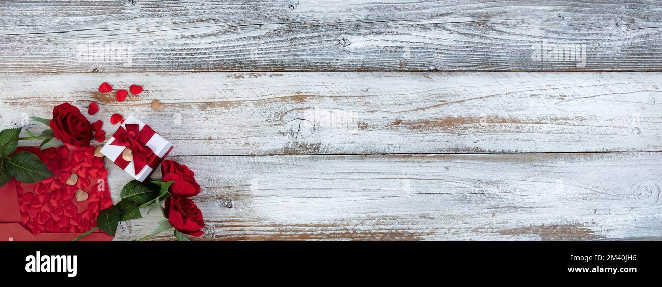 Valentines day greeting concept with envelope of small gold and red ...
