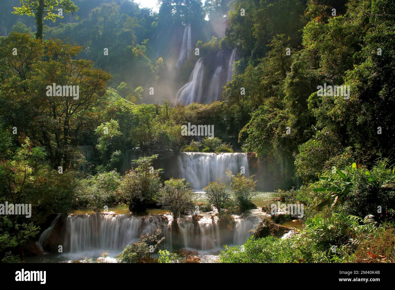 landscape photo, beautiful waterfall in green forest Stock Photo - Alamy