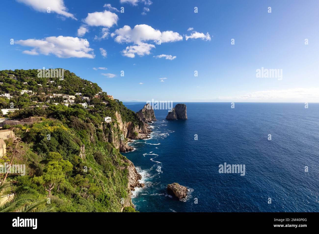 Rocky Coast by Sea at Touristic Town on Capri Island in Bay of Naples, Italy Stock Photo