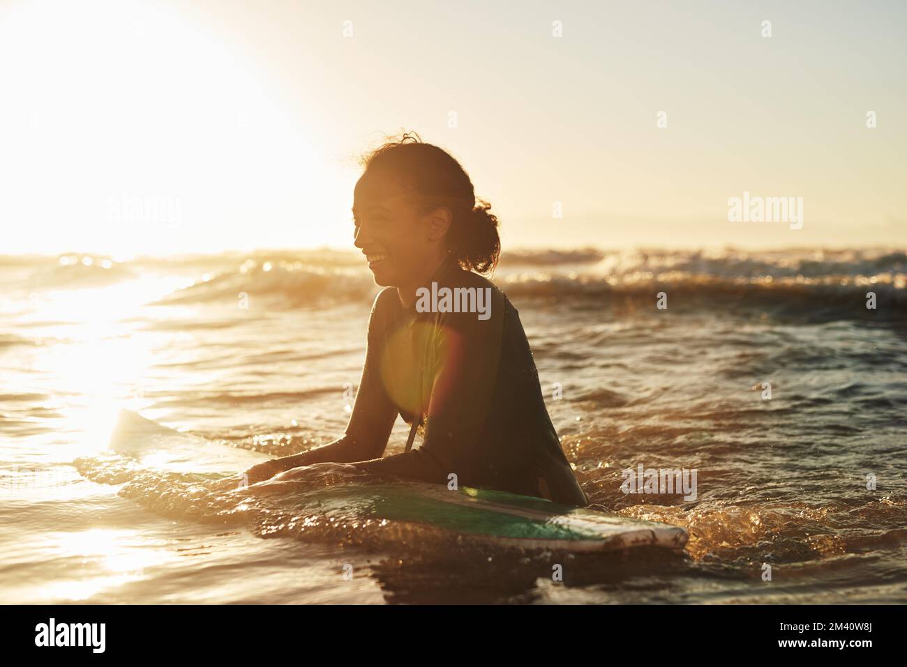 Female surfing silhouette hi-res stock photography and images - Alamy