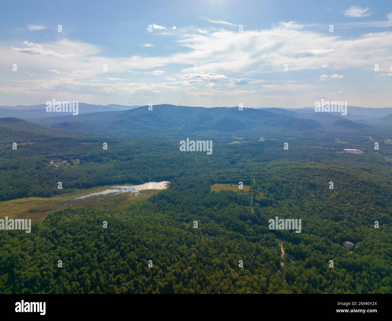 Tenney Mountain aerial view in summer with Groton Wind Power field at