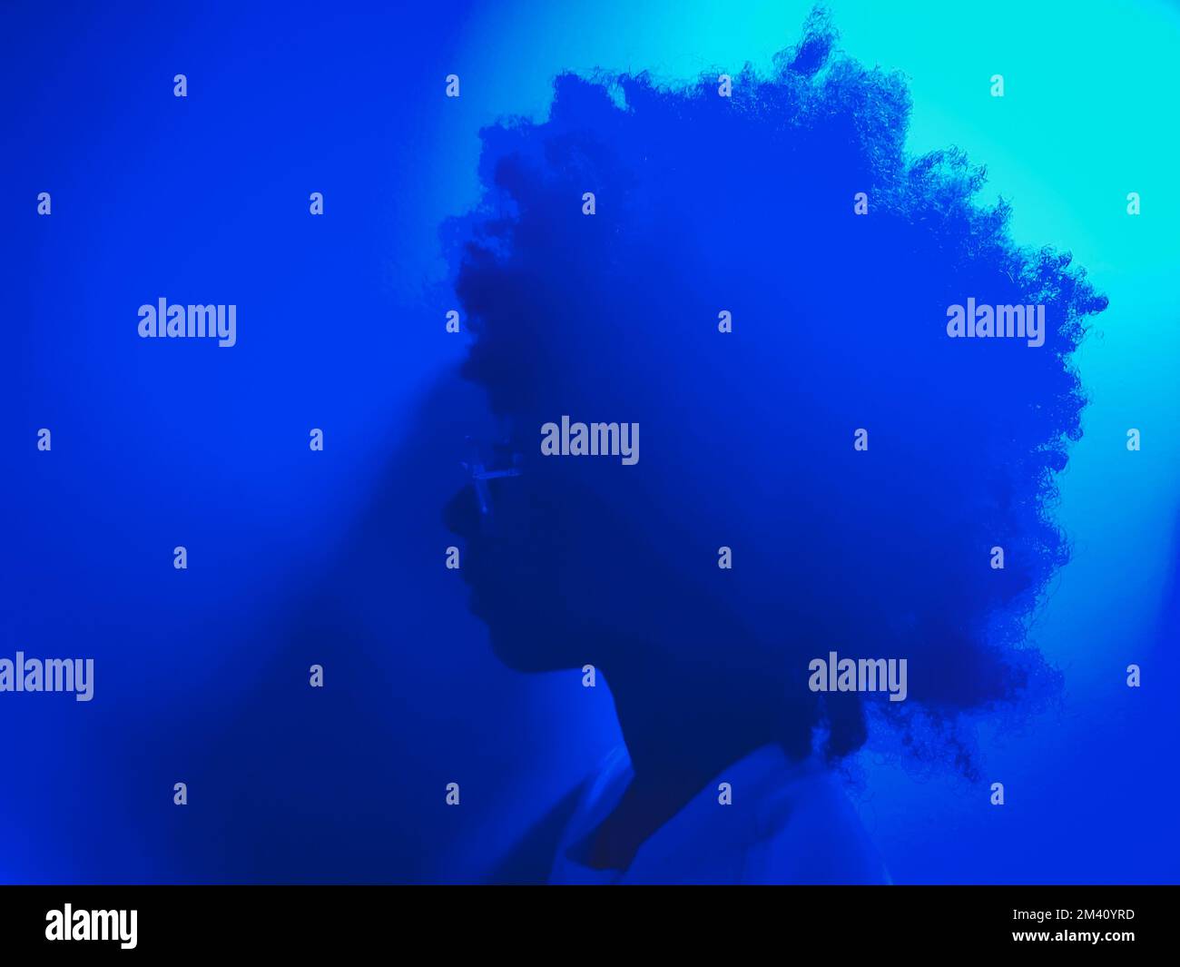 neon blue girl with afro hairstyle straight face looking forward to the ...