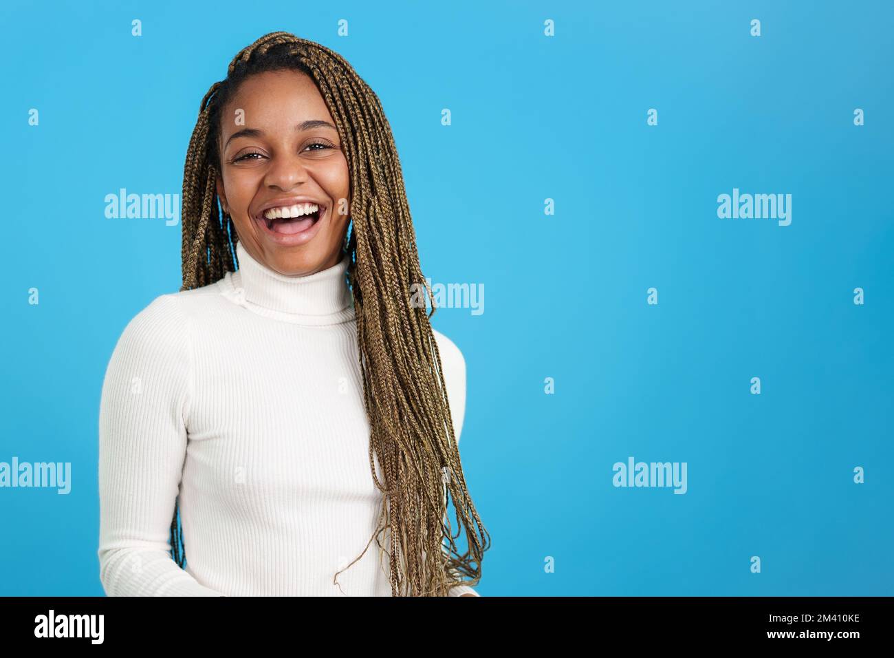 Smiley african beauty woman looking at camera Stock Photo