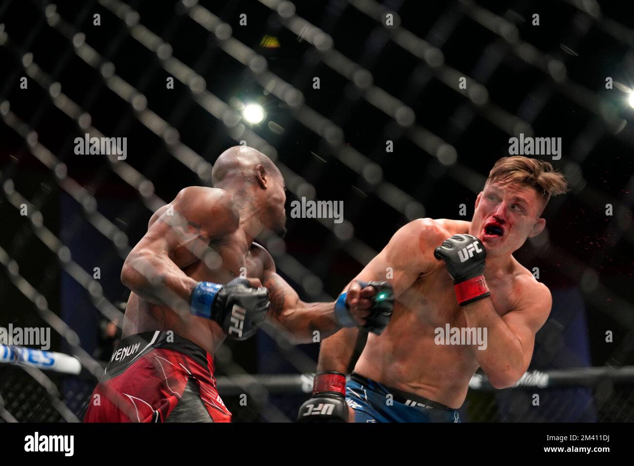 LAS VEGAS, NV DECEMBER 17 (LR) Bobby Green punches Drew Dober in their Lightweight fight