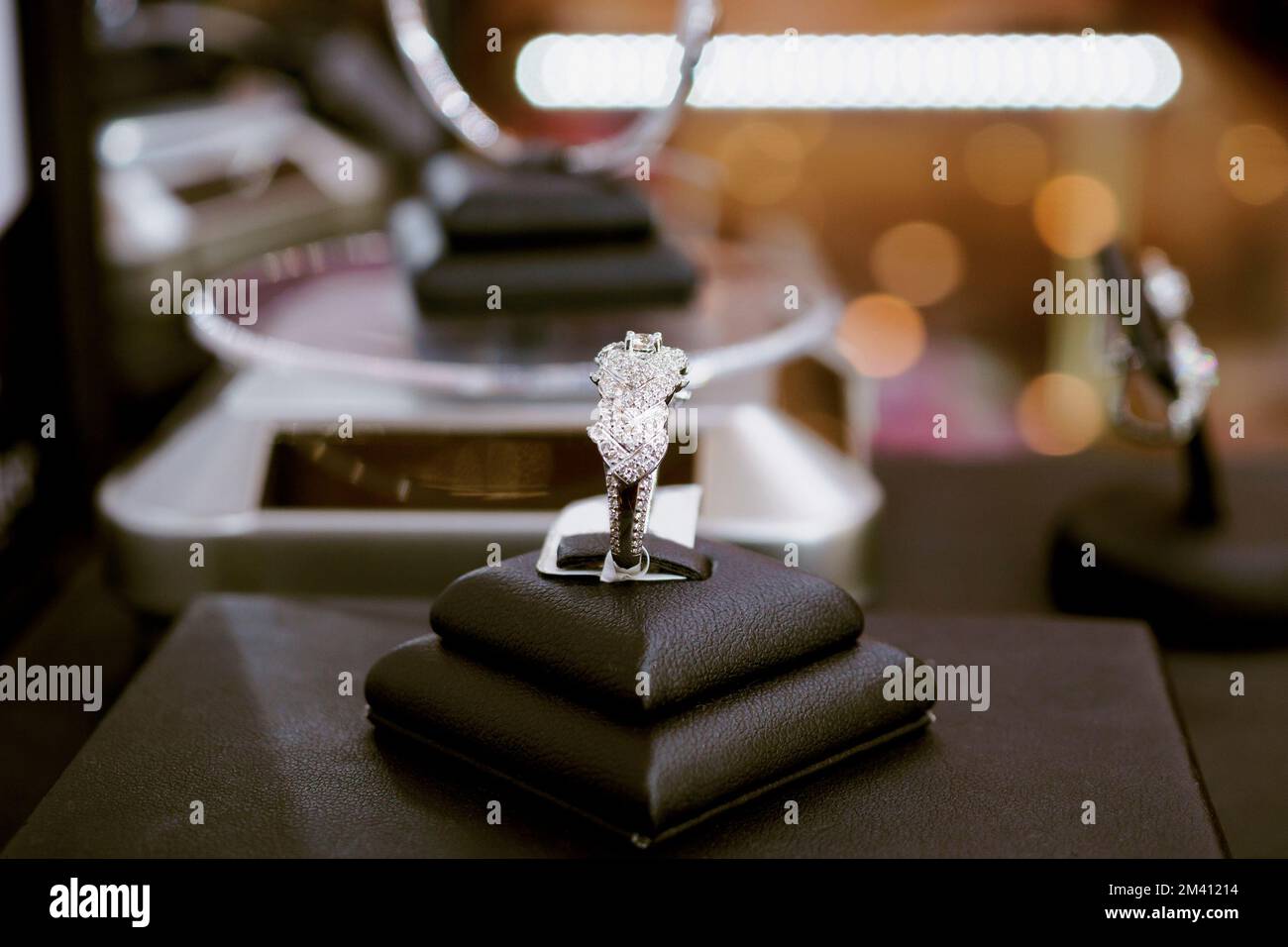 Diamond rings with blank price tag show in jewelry luxury store window