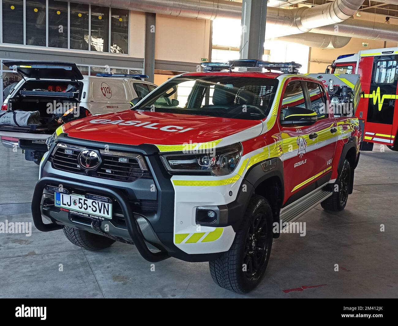 Fire truck parked in garage hi-res stock photography and