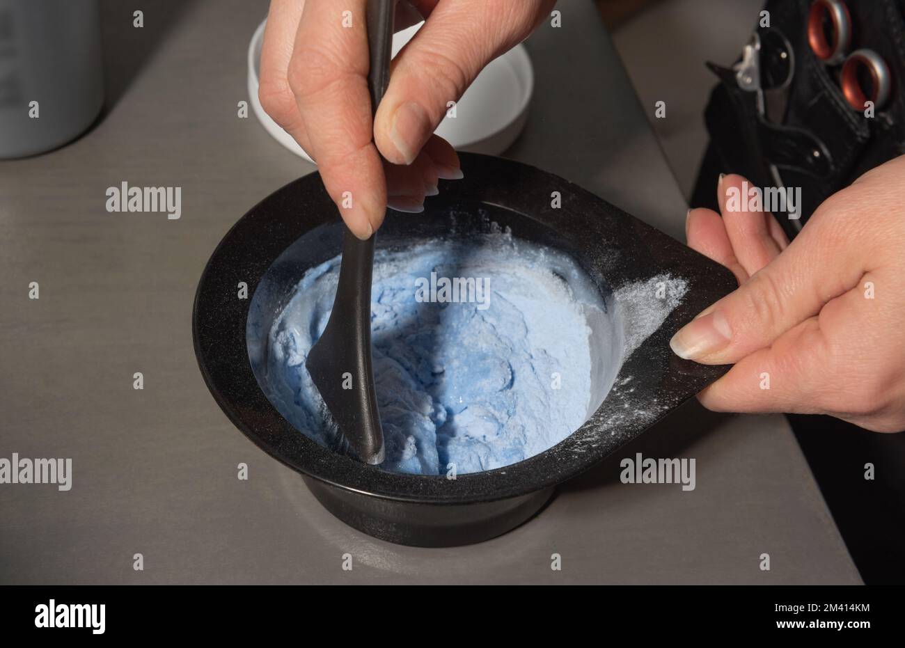 Paint mixing process for dyeing the hair Stock Photo Alamy