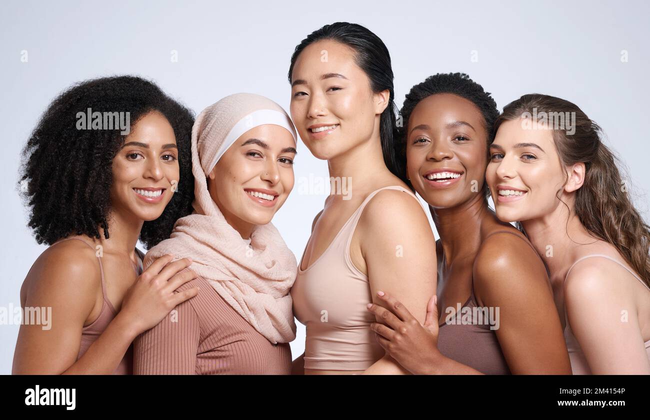 Diversity, woman and beauty portrait for body positive support, happiness and skincare wellness. Interracial models, happiness solidarity and smile Stock Photo