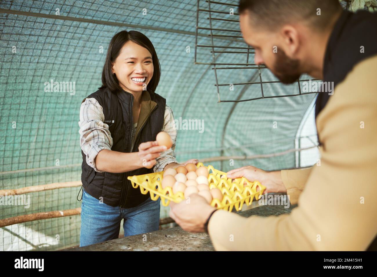 Egg production, food business and Asian woman happy about eco friendly agriculture growth of eggs. Chicken farmer, sustainability and farming product Stock Photo