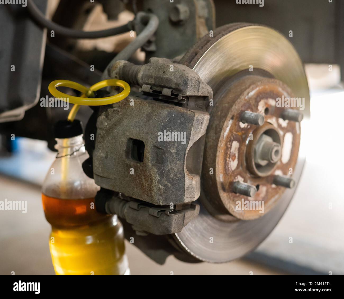 Automatic change of brake fluid in a car service Stock Photo Alamy