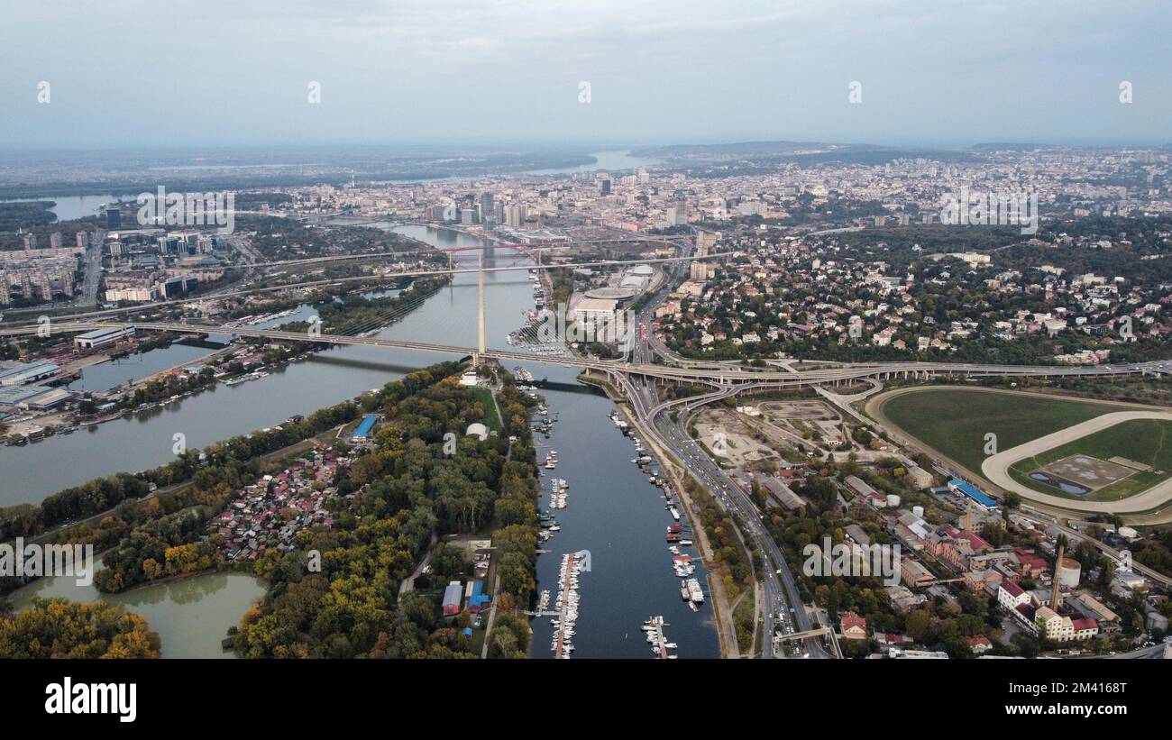 Bridge Through View A bird's eye view of bridges on a river flowing through a city Stock ...