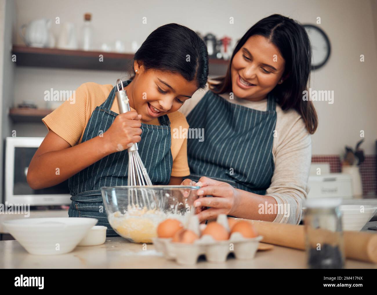 Bakery, baking and woman with girl learning to bake, cooking skill and