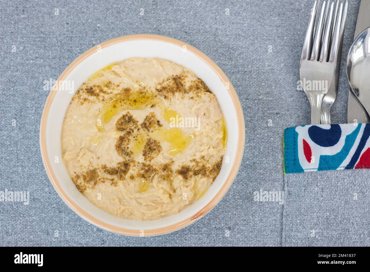 Babaganoush a la carte appetiser in a dish at a restaurant table setting Stock Photo