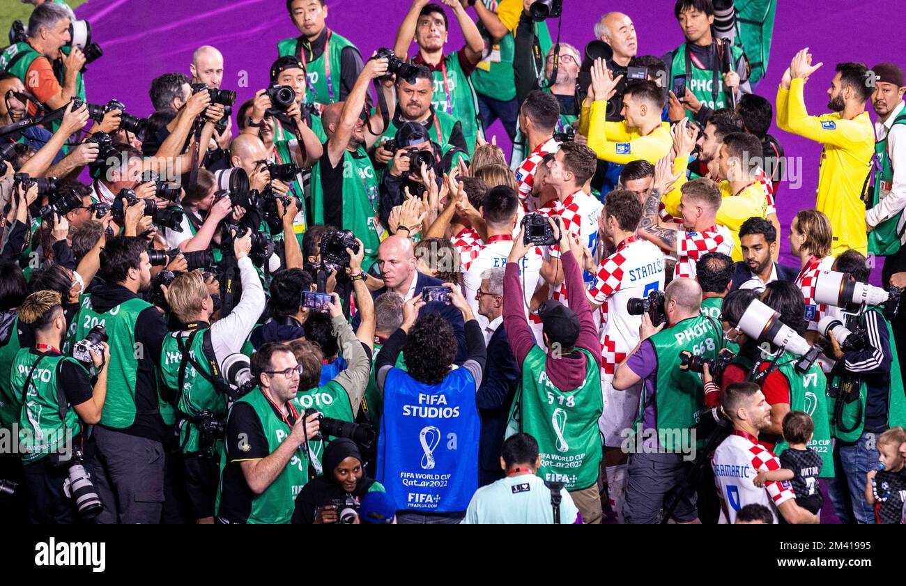 Doha, Qatar. 17th Dec, 2022. Photographers surround the Croatian team