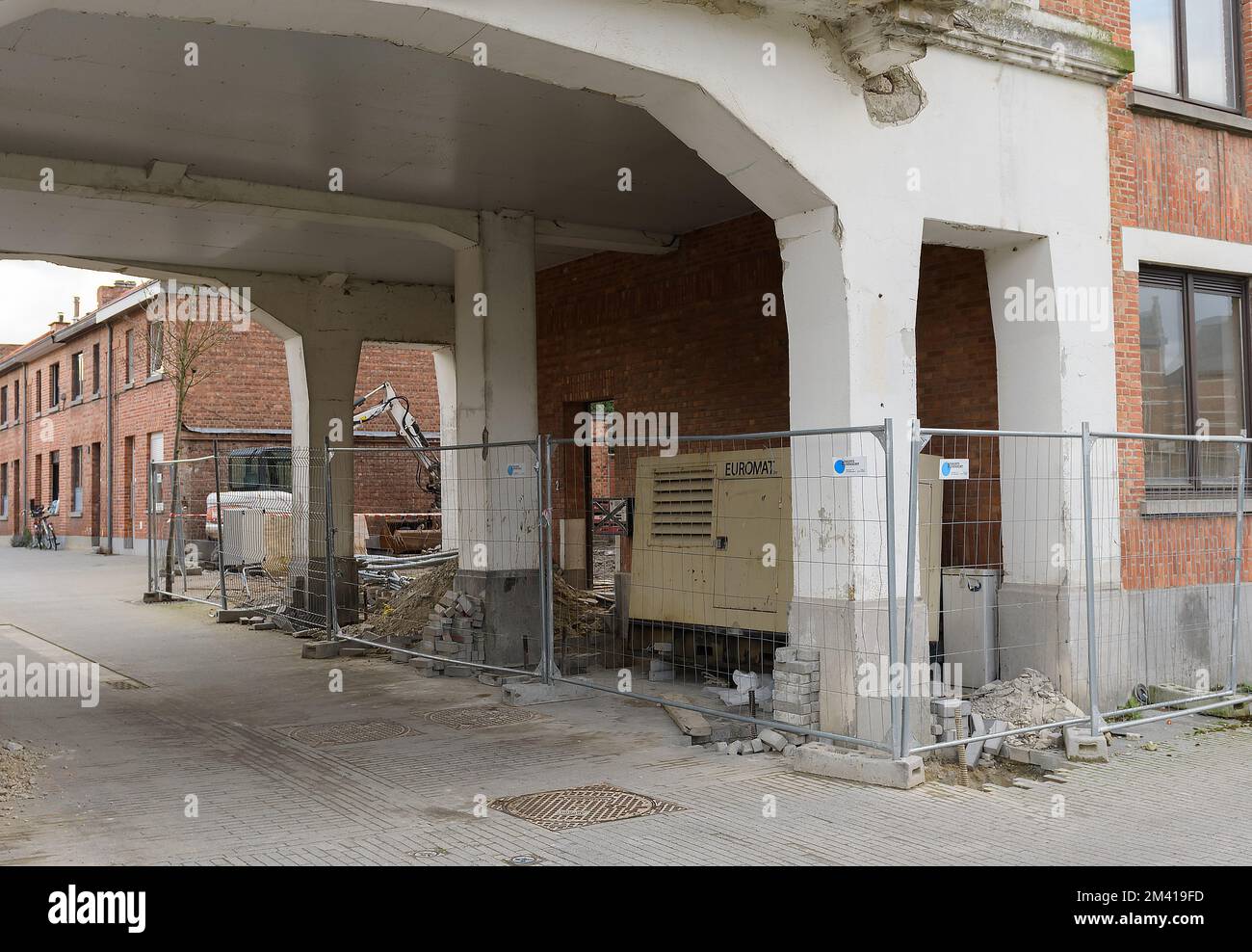 Leuven. Vlaams-Brabant - Belgium 02-01-2022 Restoration of the facade of the entrance to the building. Renovation work. Pedestrian fences. Constructio Stock Photo