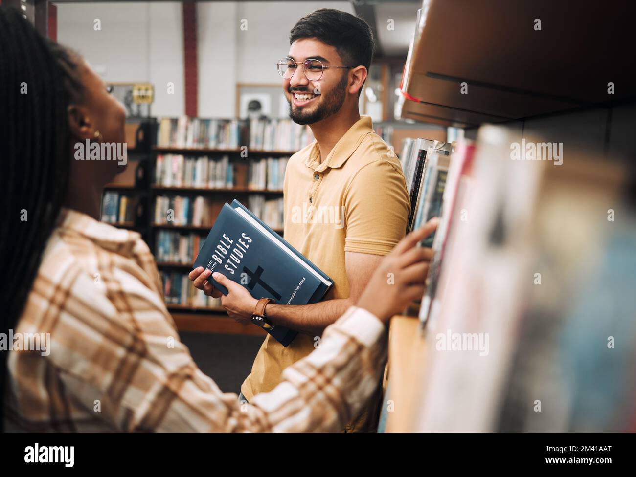 Talking students, bonding and library bookshelf on school, college and