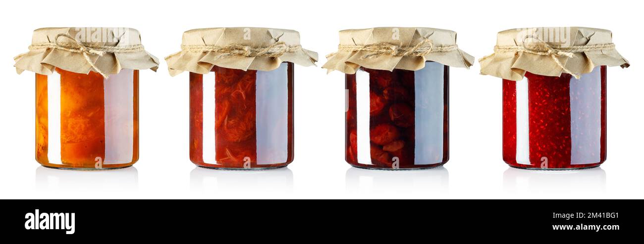 collection of jam in glass jars covered with craft paper isolated on white Stock Photo