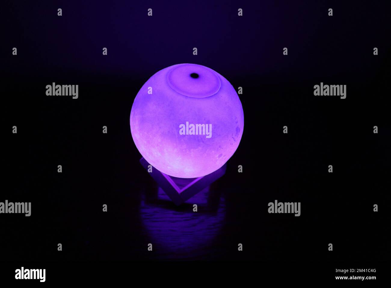 Complex moon lamp that has different colors concepts.This lamp also has ...