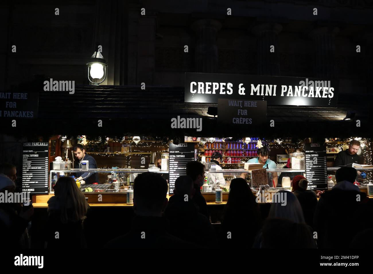 Crepes and Mini pancakes stall at the Edinburgh Christmas fair (at night) Stock Photo
