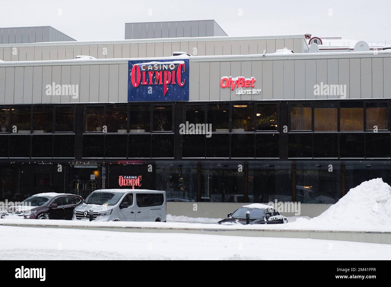 Tallinn, Estonia December 13, 2022 Olympic Casino and OlyBet sports bar signs on the building
