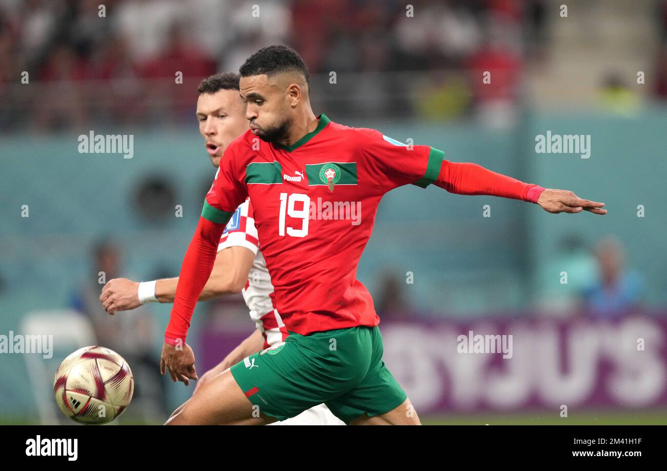 DOHA, QATAR - DECEMBER 17: Youssef En-Nesyri of Morocco competes for the ball with Ivan Perisic of Croatia ,during the FIFA World Cup Qatar 2022 3rd Place match between Croatia and Morocco at Khalifa International Stadium on December 17, 2022o in Doha, Qatar. (Photo by MB Media) Stock Photo