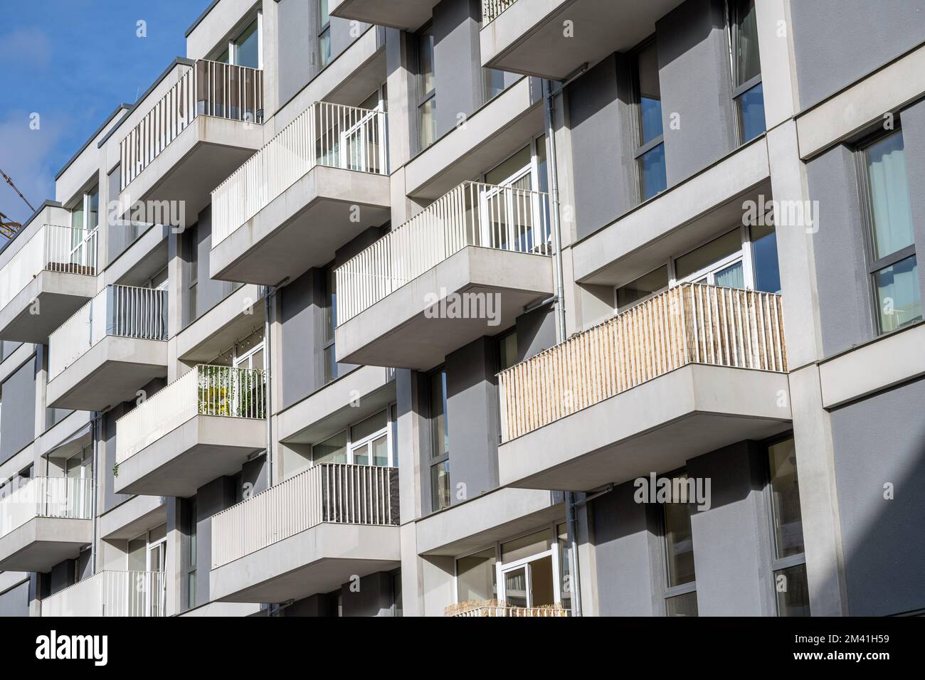 Detail of a modern gray apartment building seen in Berlin, Germany Stock Photo